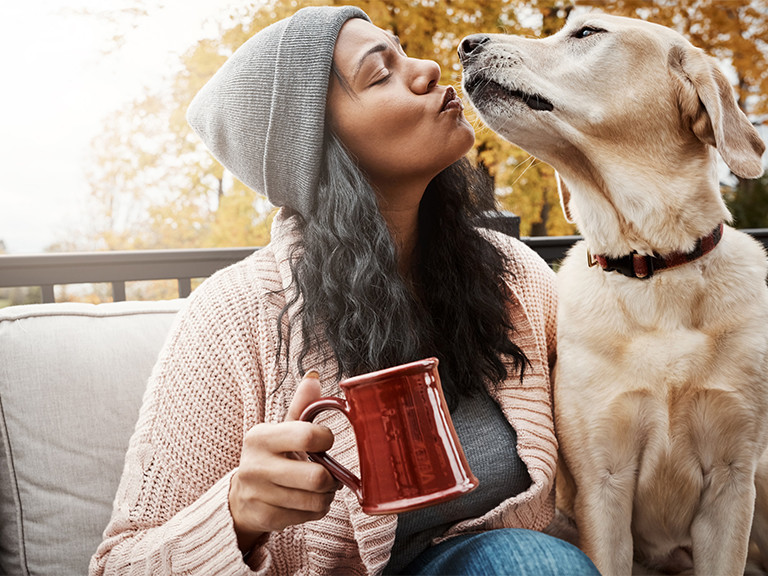 photo of woman and dog