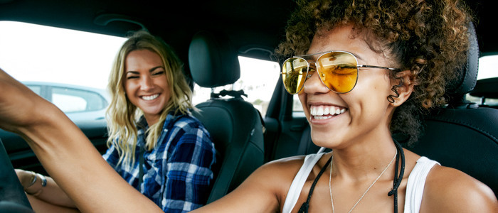 girls laughing while driving
